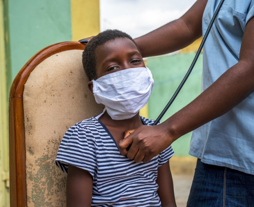 closeup-shot-boy-getting-checkup-by-doctor_181624-34912
